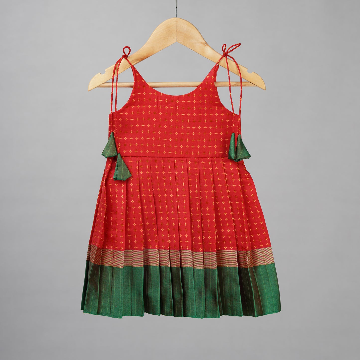 Red with Green border Aarini Frock