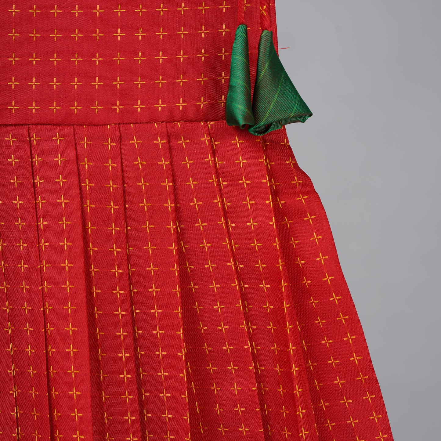 Red with Green border Aarini Frock