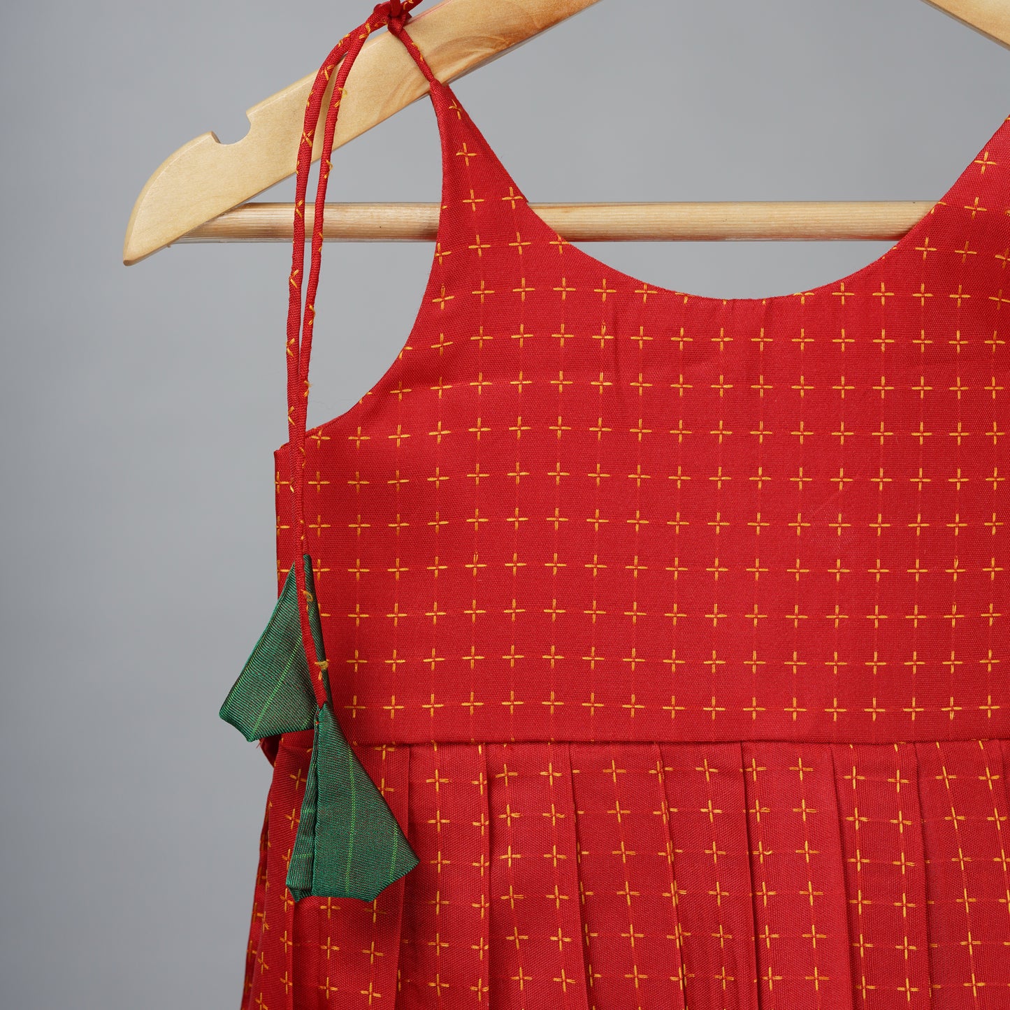 Red with Green border Aarini Frock