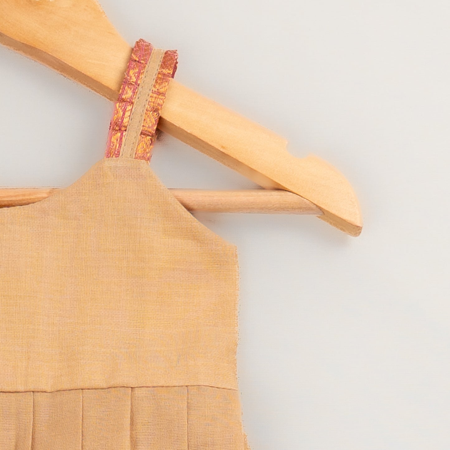 Beige Kanchi Cotton Pleated Dress with Pink Zari Border